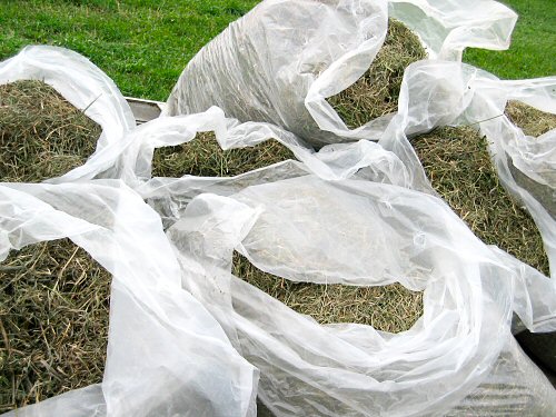 Bags of grass-and-alfalfa mulch
