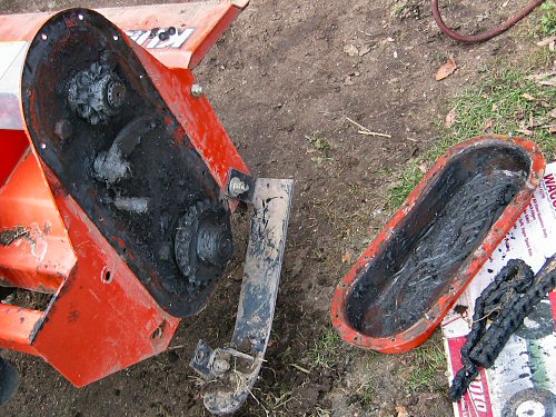Rototiller with gearbox open and chain off