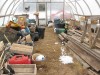 Farm gear stored in hoophouse