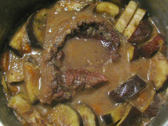Beef and eggplant stew, simmering