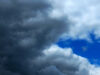 Blue sky chasing rain clouds